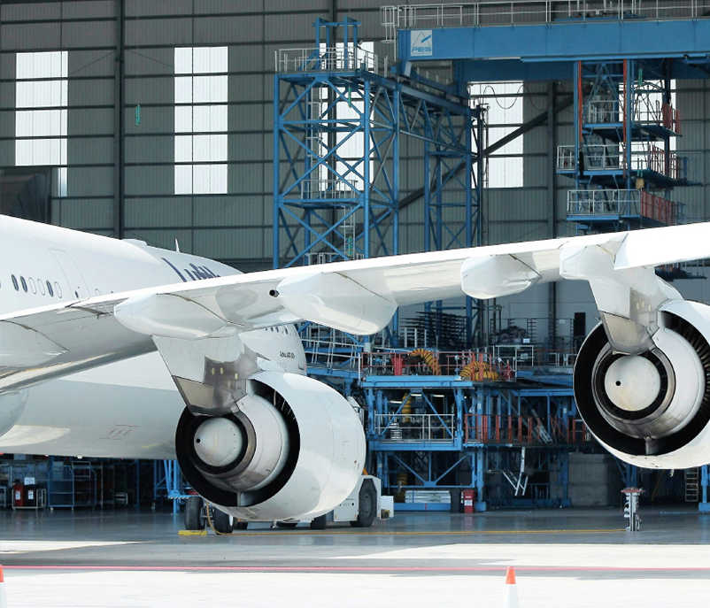 Lufthansa airplane engines and wing in aircraft hanger