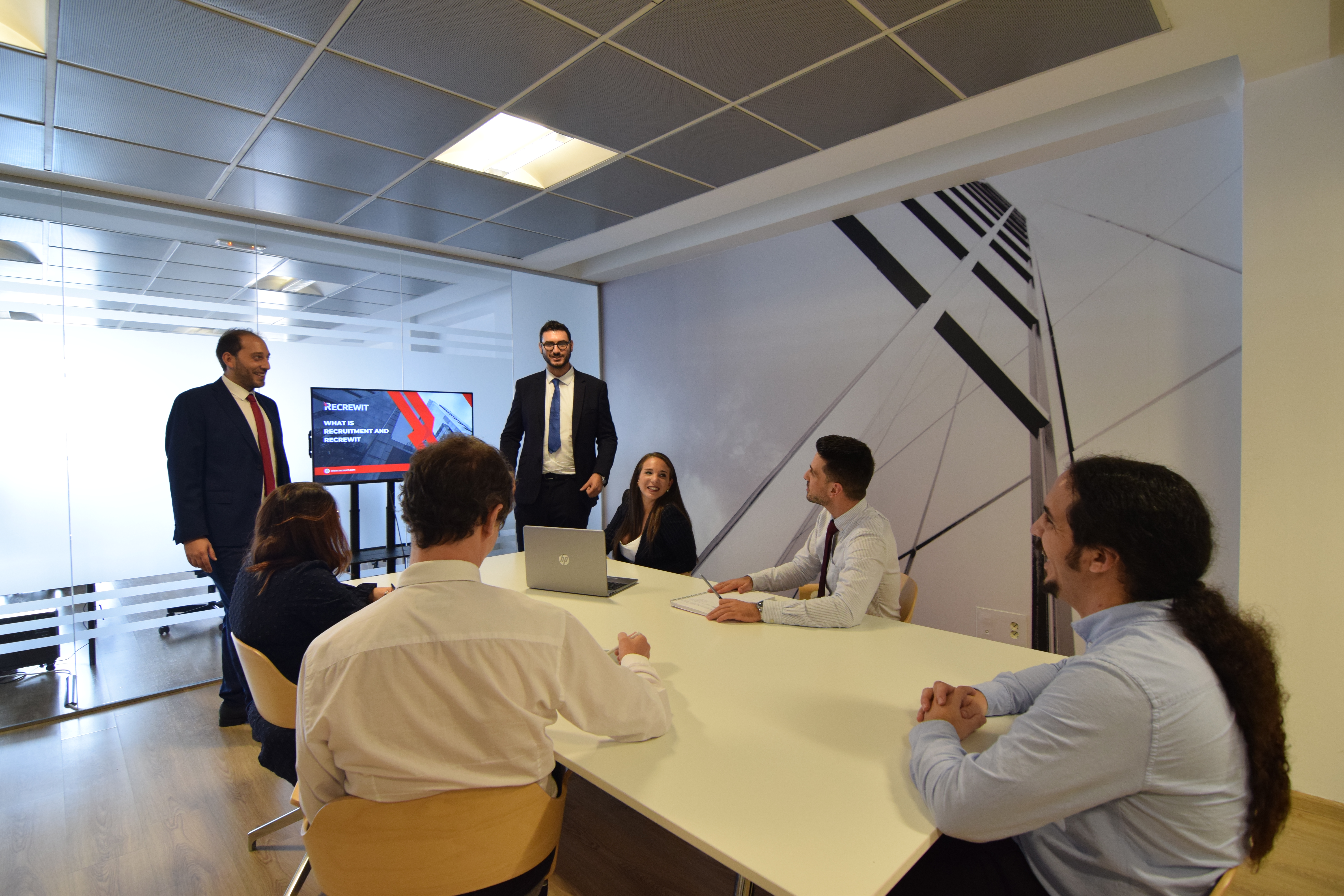 recruitment leadership team meeting to discuss candidate engagement strategies