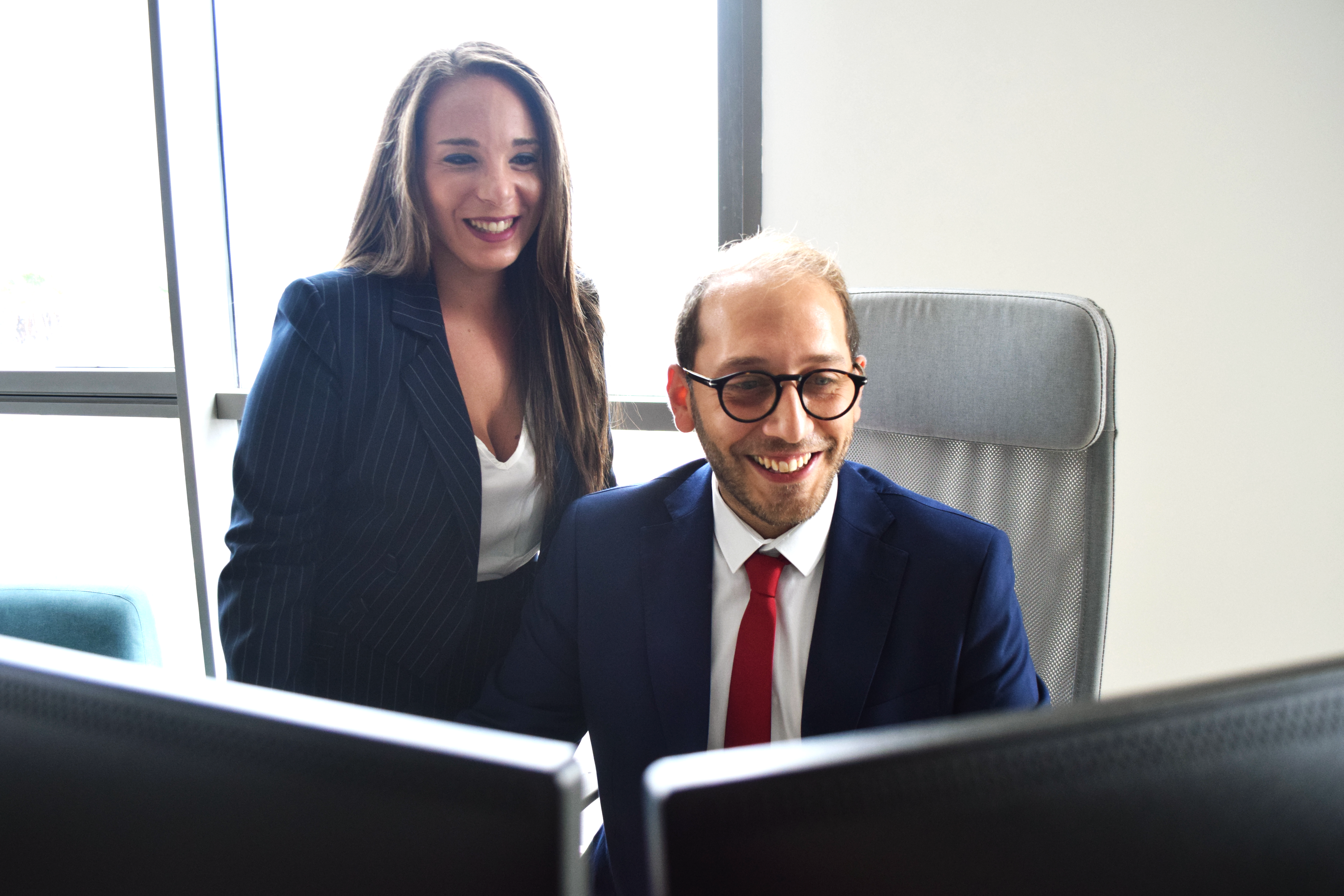 Vincenzo Segnale and Francesca Russo senior recruitment consultants in online client meeting with composites business leaders