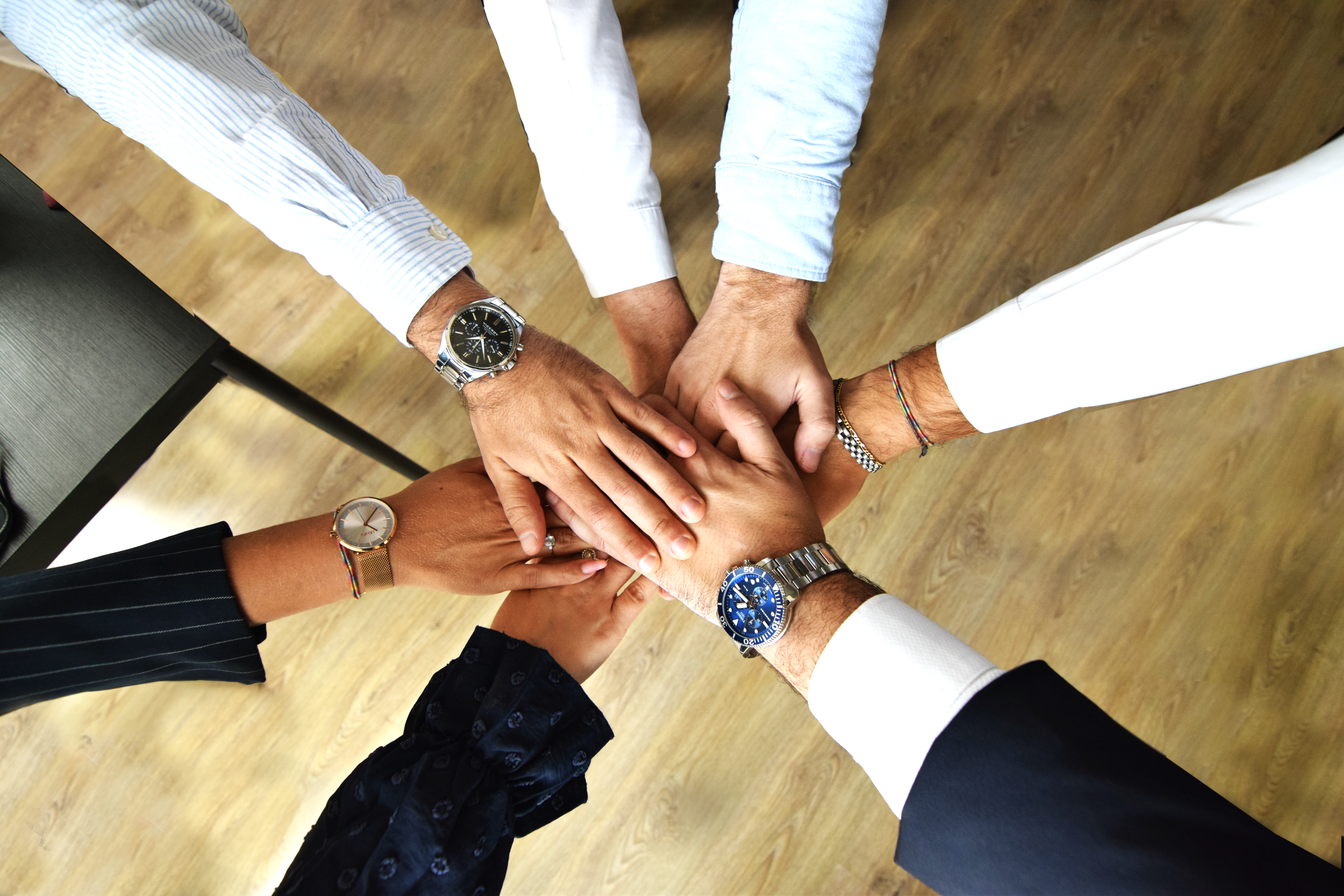 high five hands for recruiting team collaboration